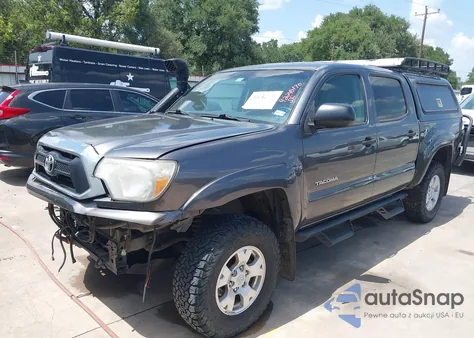 2015 Toyota Tacoma Base V6 z USA, uszkodzony, nr VIN 5TFLU4EN0FX145357